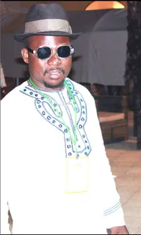 Daniel S. Nnaji in traditional embroidered attire
