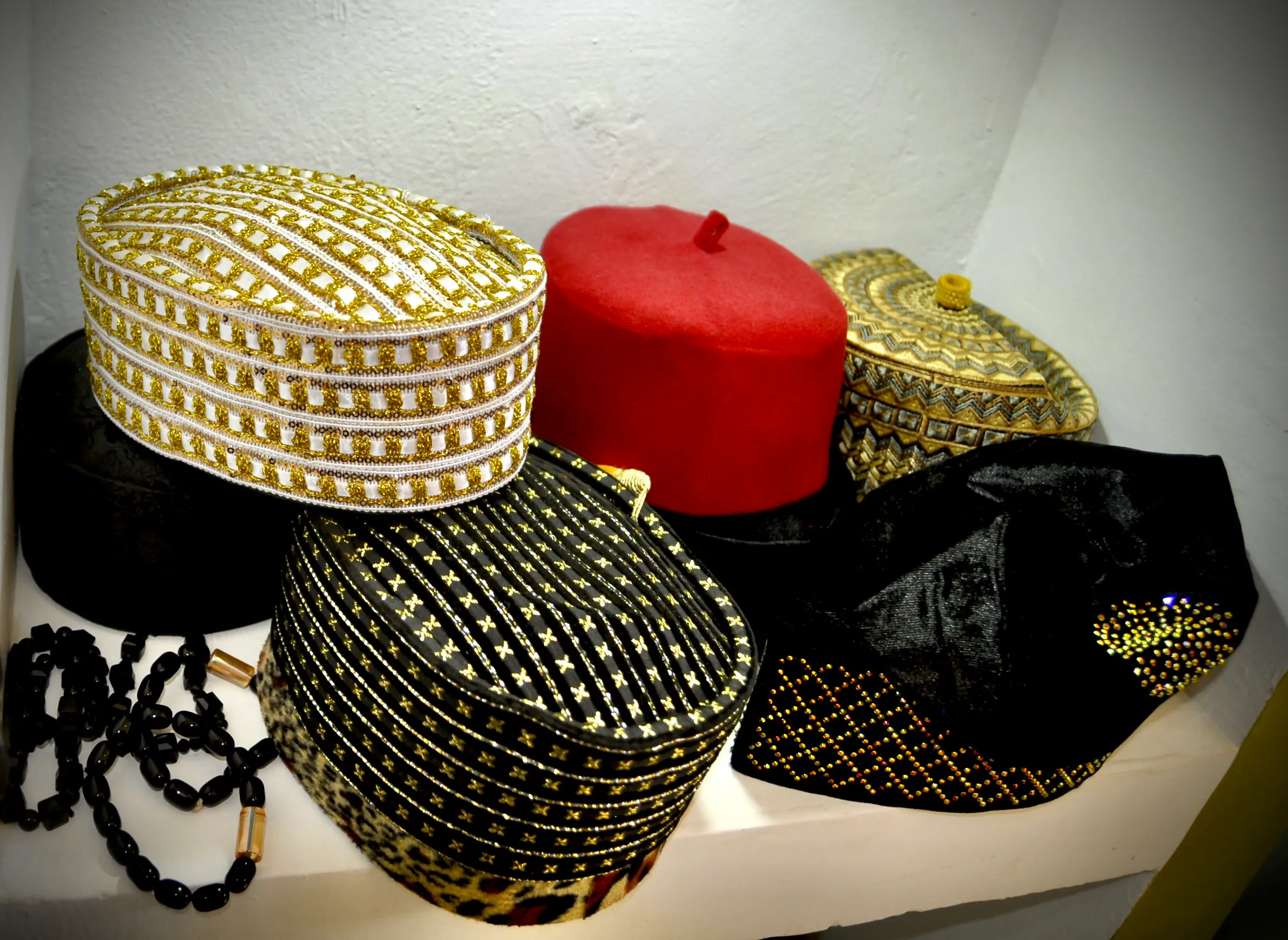 SND Designs embroidered and beaded caps